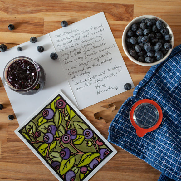 Handwritten greeting card to grandma with blueberries on the front.